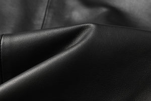 Luxurious black REED leather hide with soft, durable texture, ideal for crafting unique art pieces, featuring an antique finish.