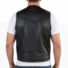 Load image into Gallery viewer, Black leather vest worn by a person on a white background
