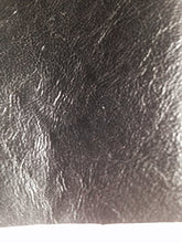 Load image into Gallery viewer, Close-up of REED leather hide showing soft, durable texture and antique finish, perfect for crafting art pieces.
