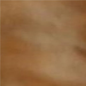 Close-up of REED luxurious sheepskin leather hide in antique finish with warm, earthy tones.