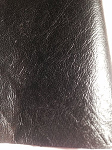 Close-up of REED leather hide in black, soft sheepskin with an antique finish, ideal for crafting unique art pieces, 7 to 10 SF.