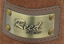 Load image into Gallery viewer, REED brand logo embossed on antique finish leather hide, showcasing craftsmanship since 1950.
